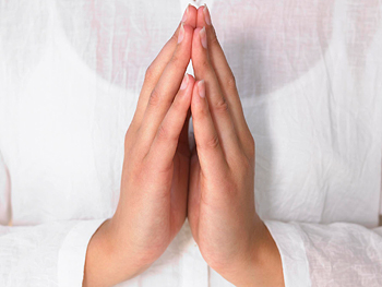 Image of palms together in prayer seal (Anjali Mudra)